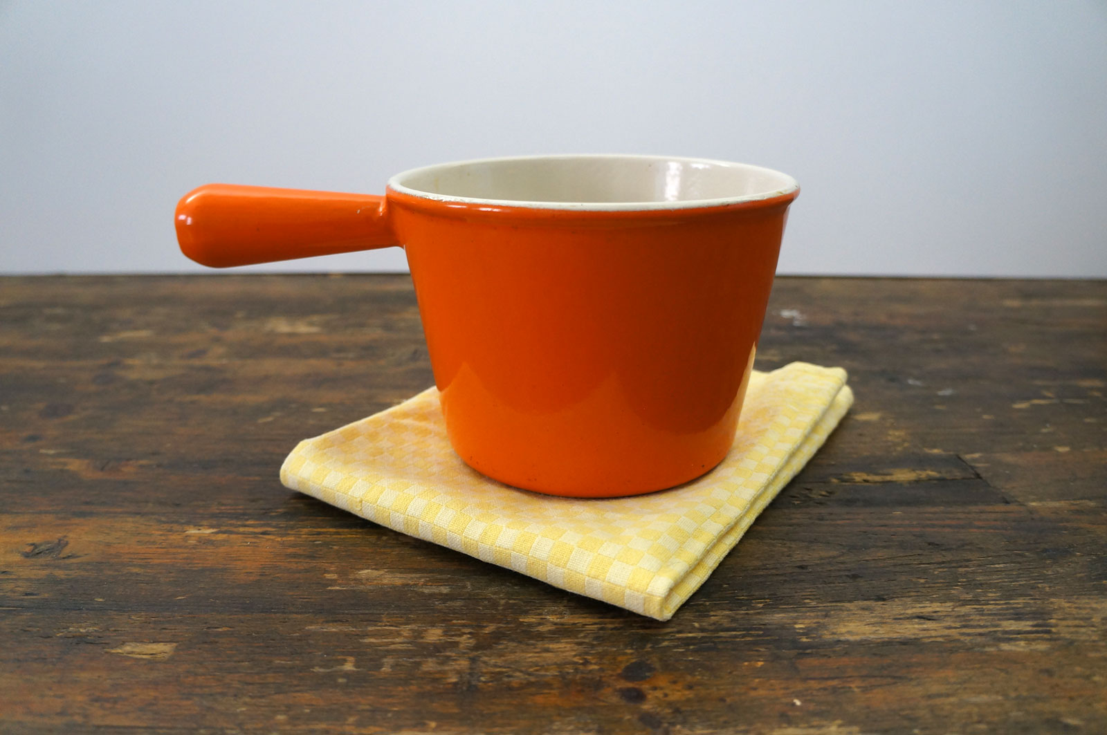 Oranje gietijzeren fonduepan Le Creuset