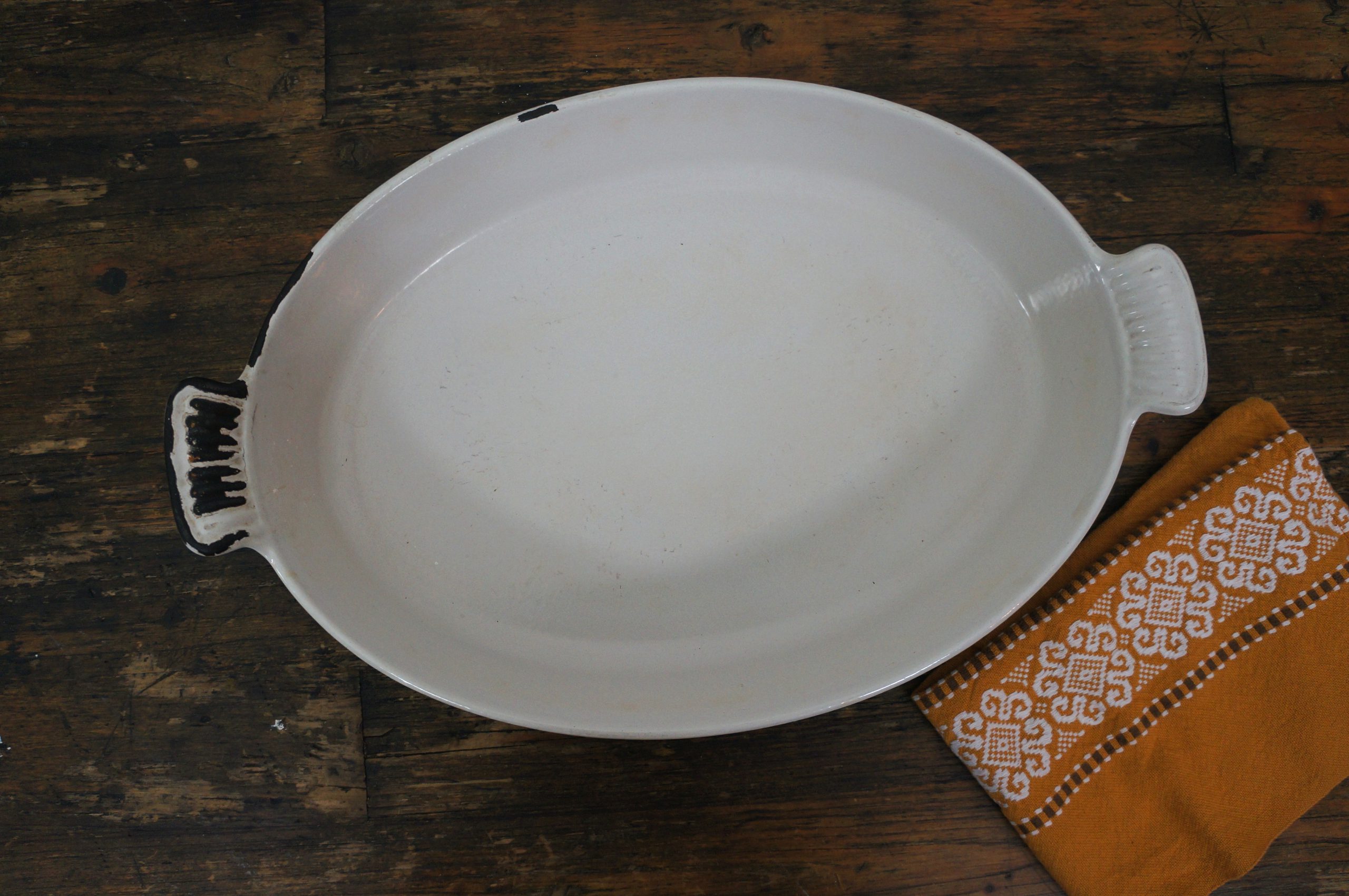 Bruine ovale ovenschaal Le Creuset maat 36